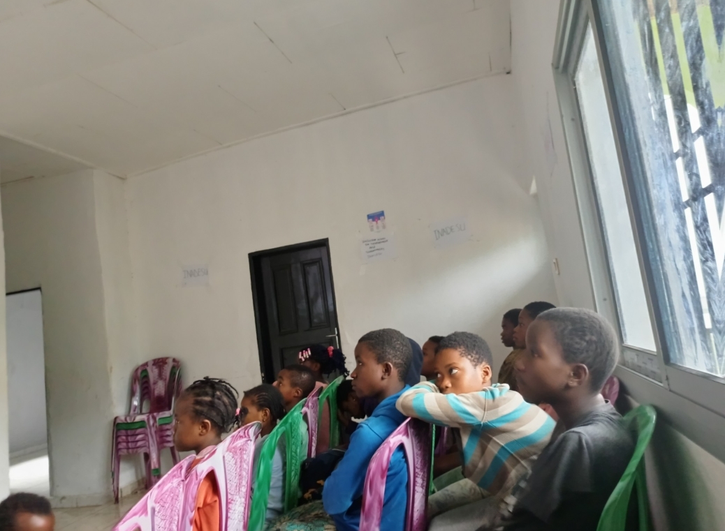 Children at the Children Safe Space discussing the movie on bullying