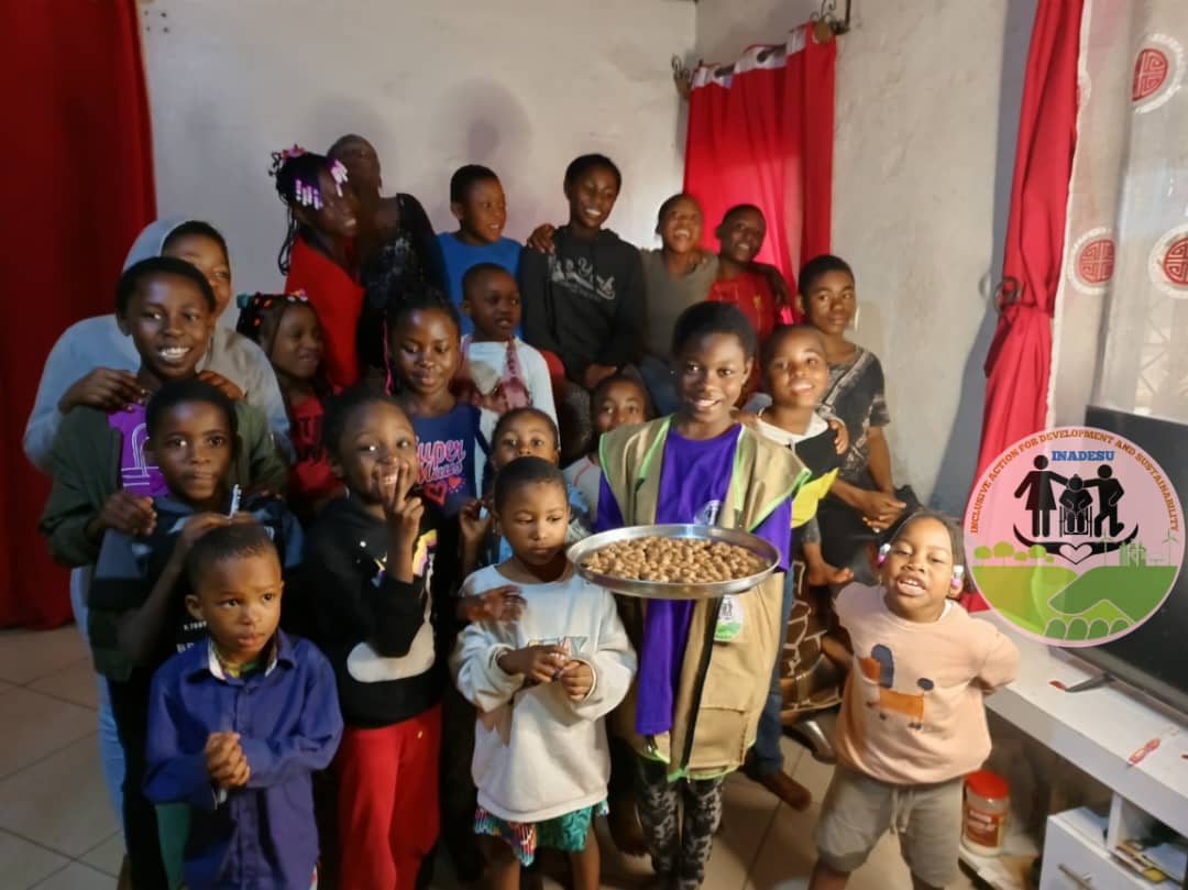 Children learning to make local sweets during an entrepreneurial skills workshop
