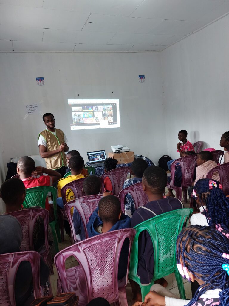 Children taking part in summer holiday workshop activities