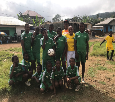 Children taking part in a football activity